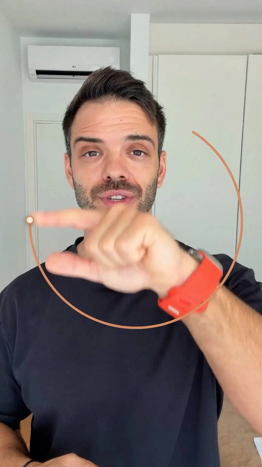 A frame from the Reel: a bright line tracks Denis's fingertip, drawing a circle in mid-air.